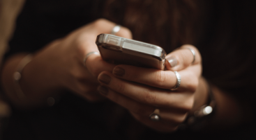 by phone