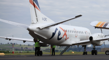 Photo of an aeroplane on the tarmac and showing Regional Express branding.